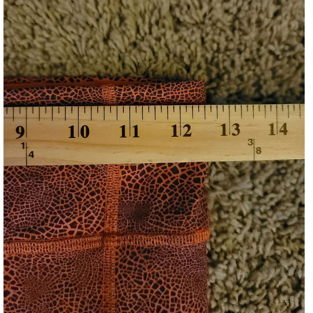 Lululemon Invigorate High-Rise Tight 25” in Crackle Orange, sz 6
